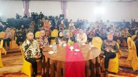 Bupati Bone Bolango, Ismet Mile (kedua dari kiri) saat menghadiri acara yang diselenggarakan BPJS Ketenagakerjaan [foto:dok/kominfo]