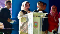 Ny. Maryam Sofyan Puhi memberikan sambutan pada kegiatan Ruang Temu Anak Forum Anak For Hulondhalo Kabupaten Gorontalo di Pentadio Resort, Kecamatan Telaga Biru, Ahad 23 Agustus 2026. [foto:dok/kominfo]