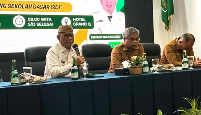 Bupati Bone Bolango, Ismet Mile saat membuka Bimbingan Teknis Pengelolaan Dana BSOP 2026 di Grand Q Hotel Kota Gorontalo, Selasa 22 September 2026. [foto:dok/inda/kominfo]