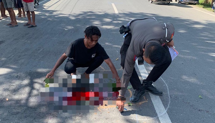 Olah TKP yang dilakukan Polresta Gorontalo Kota terkait tabrak lari yang terjadi di Jalan Raja Eyato. (Foto: Ist)