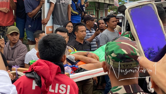 Proses evakuasi korban tanah longsor di lokasi tambang emas Suwawa Timur beberapa hari lalu. Hanya saja, masih ada 15 orang yang hingga kini belum ditemukan. [foto:nusantara1]