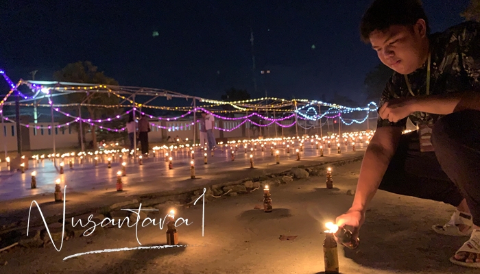 Ribuan cahaya dari lampu botol yang disuguhkan SMA Negeri 3 Kota Gorontalo pada Festival Tumbilotohe. [foto: fikarbuntuan/nusantara1]