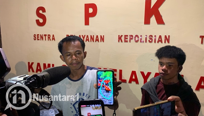 Elfin, salah seorang keluarga Alm. Muhammad Jeksen, saat melapor ke Polda Gorontalo, Senin malam, 22 September 2025. [foto:fikar/nusantara1]