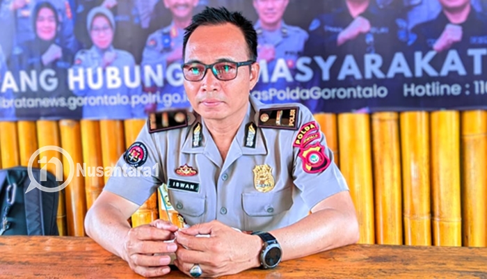 Perwira Subbid Penmas Bidang Humas Polda Gorontalo, IPDA Iswan Hinelo saat diwawancarai awak media. [foto:juna/nusantara1]
