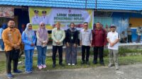 Foto bersama Sekda Bone Bolango, Iwan Mustapa dengan stakeholder dan jajaran Polres Bone Bolango usai meresmikan Toko Pengendalian Inflasi di Pasar Kamis [foto:dok/humaspolres]
