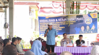 Wakil Ketua DPRD Gorontalo Utara, Ridwan Riko Arbie saat memberikan sambutan dalam kegiatan Sosialisasi dan Penandatanganan Kerjasama [foto:dok/gotimes]