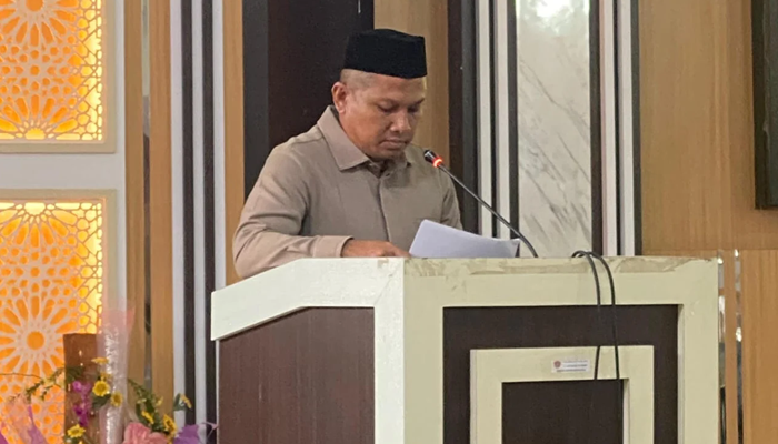 Anggota Badan Kehormatan DPRD Gorontalo Utara, Daud Syarif, saat membacakan laporan di Paripurna [foto:dok/gotimes]