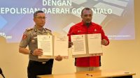 PLN Nusantara Power Unit Pembangkitan Gorontalo bersama Polda Gorontalo melaksanakan penandatanganan PKS dan Pedoman Kerja Teknis untuk memperkuat sinergi pengamanan operasional ketenagalistrikan. [foto:dok/pln]