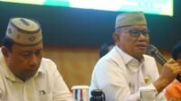 Bupati Bone Bolango, Ismet Mile saat membuka Bimbingan Teknis Pengelolaan Bantuan Dana Operasional Satuan Pendidikan 2026 jenjang SMP di Hotel Aston Kota Gorontalo, Kamis 1 Oktober 2026. [foto:dok/yudi/prokopim]